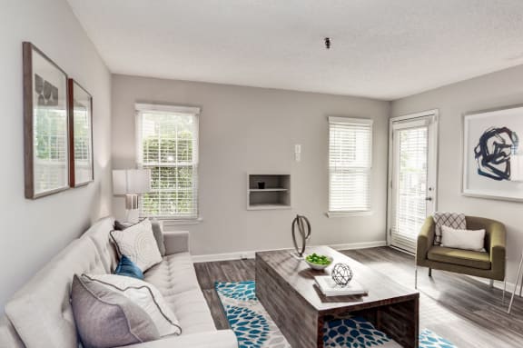 a living room with a couch and a coffee table at Hamilton at Kings Place, Maryland, 21046