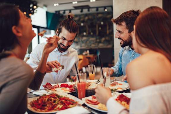A group of people enjoying a meal at The Terrace Apartments, Maryland