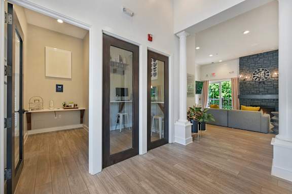 A living room with wooden floor  at Poplar Glen Apartments, Columbia, MD, 21044.