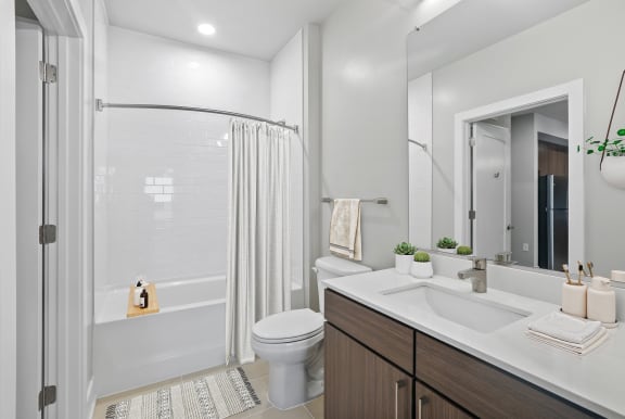 Bathroom With Bathtub at Woodmore Apartments, Bowie, MD, 20706