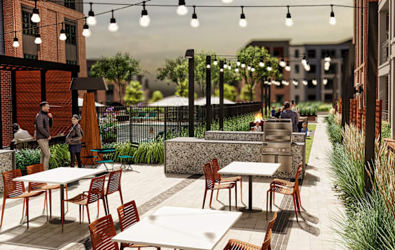 A patio with tables and chairs is shown in the image.