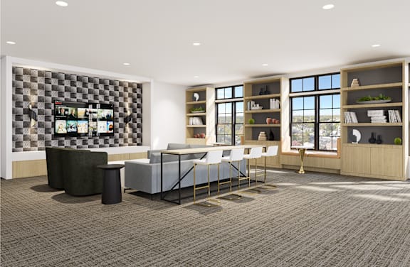 A modern living room with a grey carpet and a black and white checkered wall.
