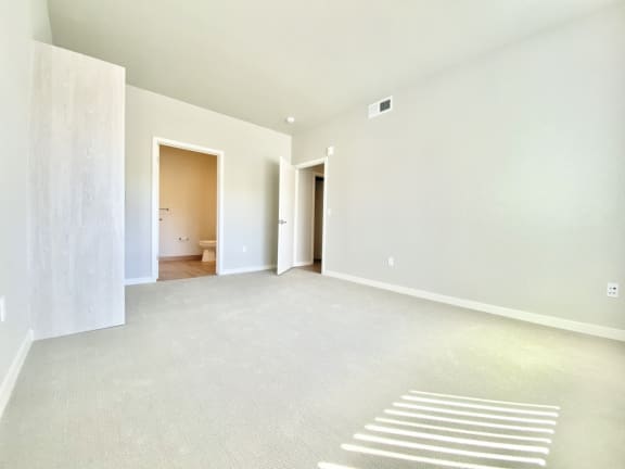2 bed 2 bath bedroom with carpet