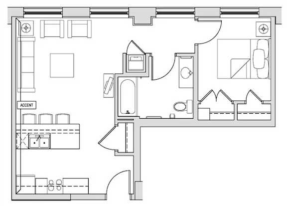 A floor plan of a house with a kitchen, living room, and bathrooms.