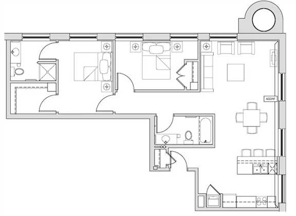 A floor plan of a house with a kitchen, living room, and bathrooms.