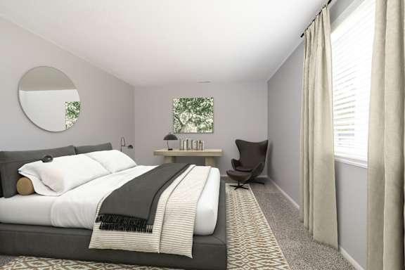A bedroom with a large bed and a chair.