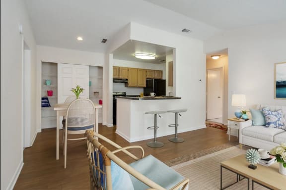 Living room with kitchen Aqua Bay Apartments in Naples, FL 34116