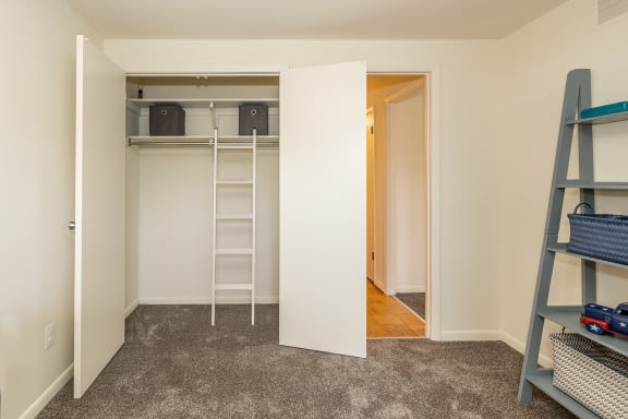 a bedroom with a bunk bed and a ladder at Chapel Valley Townhomes, Maryland