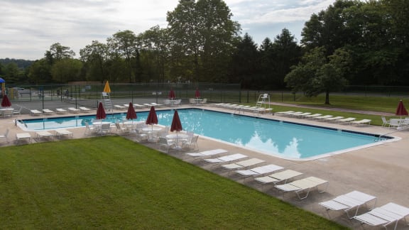 Cromwell Valley Swimming Pool with Lounging Area at Seminary Roundtop Apartments, Lutherville, MD