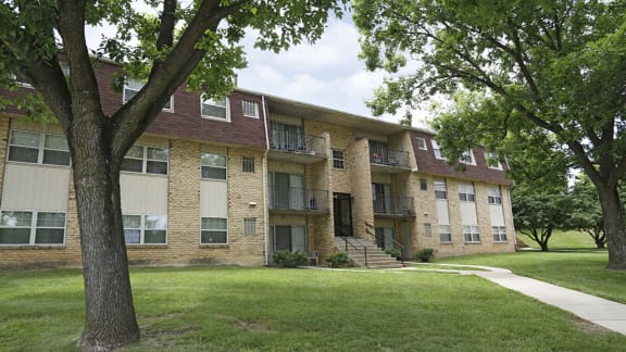 Scenic, and mature landscape at Village of Pine Run at The Village of Pine Run Apartments in Windsor Mill, MD
