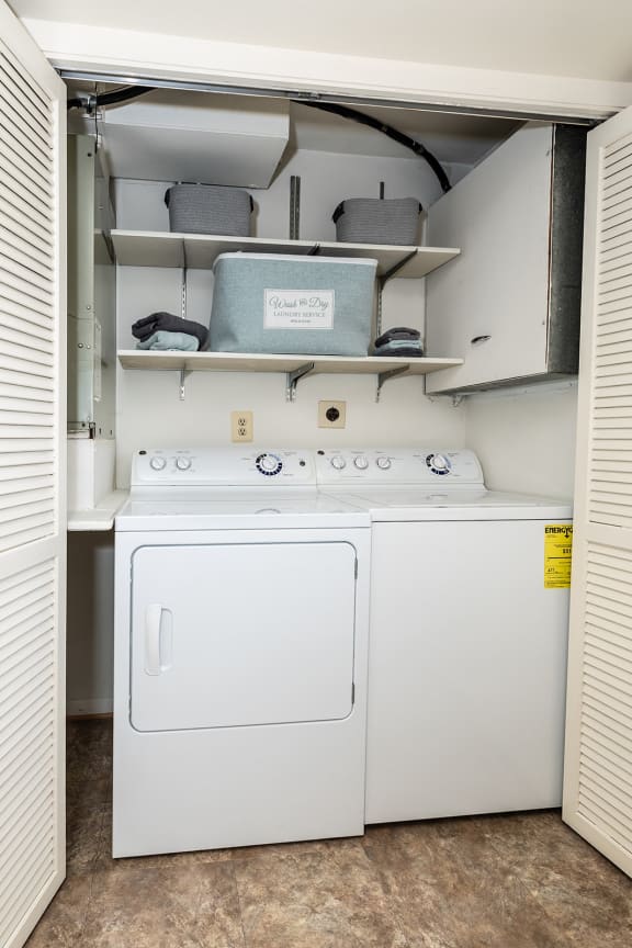 a washer and dryer are located in the laundry room at Chapel Valley Townhomes, Maryland, 21236