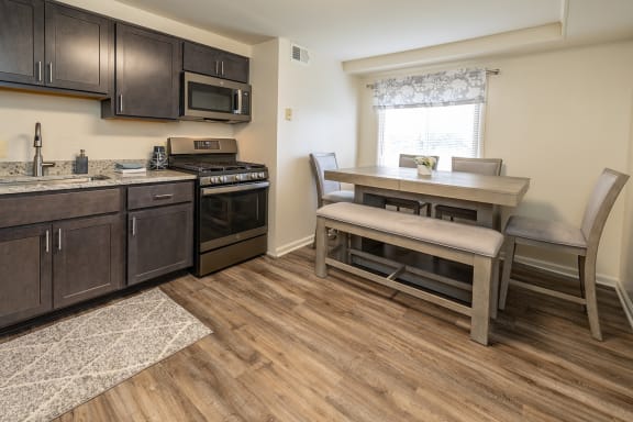 Kitchen With Dining at Windsor House Apartments*, Baltimore, Maryland