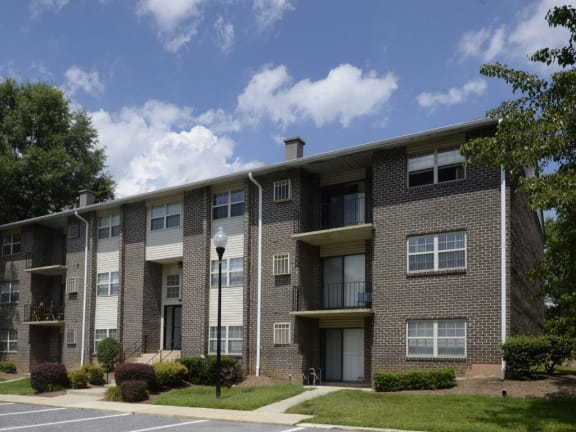 Deer Park Apartments Front Exterior with off street parking for residents and guests at Deer Park Apartments, Randallstown