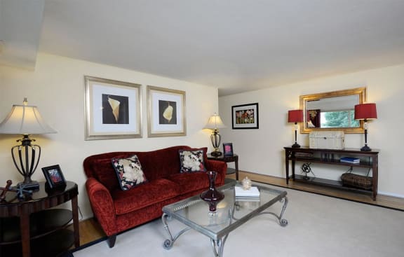 Living Area With Kitchen View at Windsor House Apartments*, Baltimore, MD