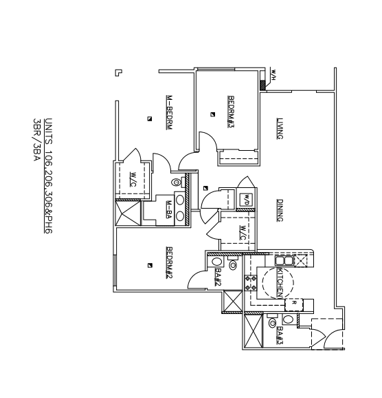 A floor plan of a house with a kitchen, living room, and two bathrooms.