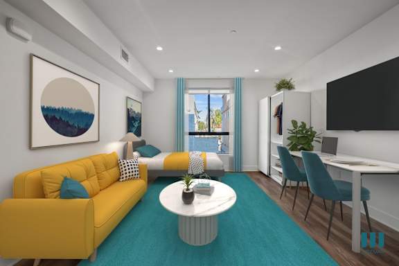 A living room with a yellow couch and a white coffee table.
