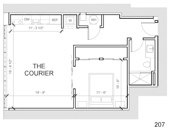 a floor plan of a small house with a bedroom and a bathroom