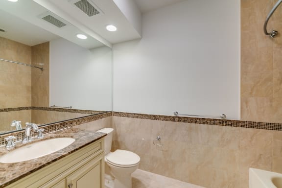 Renovated Bathrooms With Quartz Counters at Infinity Edgewater, New Jersey