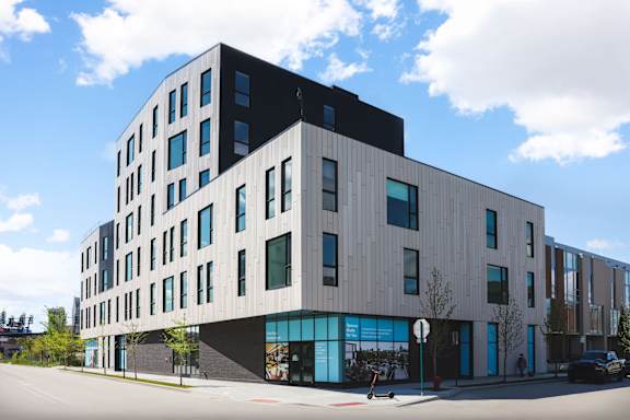 A modern building with a black and white facade.