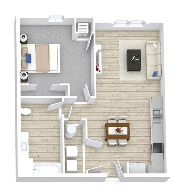 A top down view of a living room with a couch, a coffee table, and a television.