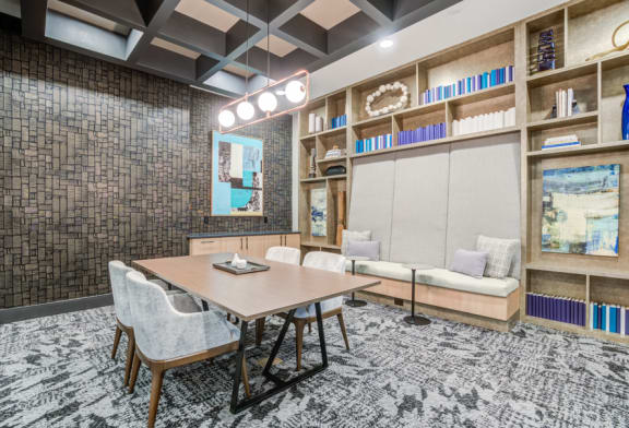 a conference room with a table and chairs