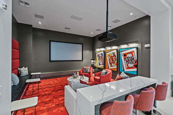 a conference room with a white table and chairs at Altis Twin Lakes Apartments, Florida