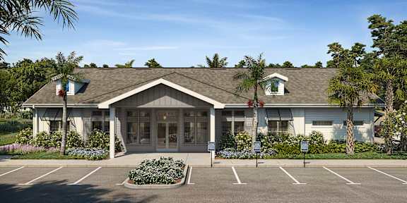 A building with a parking lot in front of it.