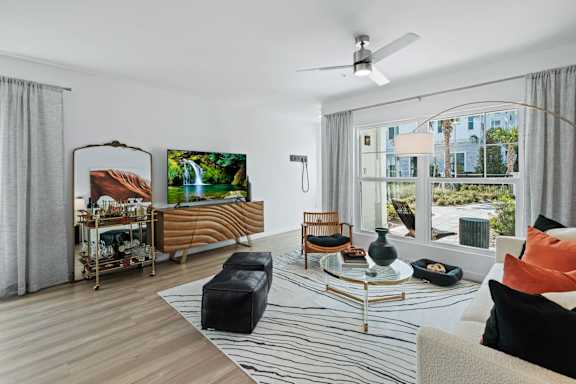 a living room with a couch at Altis Twin Lakes Apartments, Florida, 34744