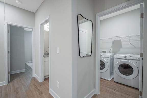 A laundry room with a washer and dryer.