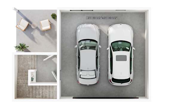 Two white cars are parked in a parking lot.