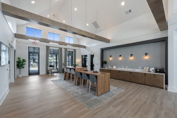 a large kitchen and dining room with a large table and chairs