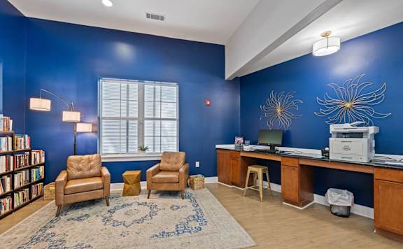A room with blue walls and a large window.