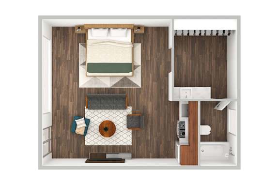 A small room with a bed, a table, and a chair.