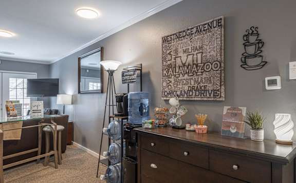 A kitchen area with a wooden counter and a fridge at Winchell Way Apartment , Kalamazoo, Michigan