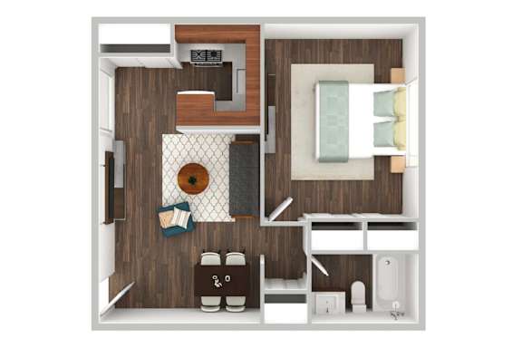 A small room with a bed, a table, and a chair.