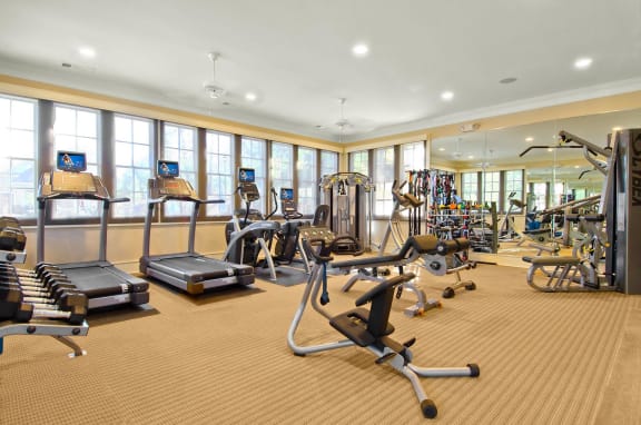 fitness center with cardio equipment