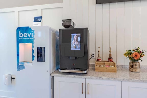 A fridge with a BevMo advertisement on it.
