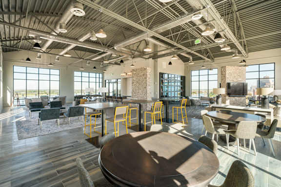 A large open space with tables and chairs.