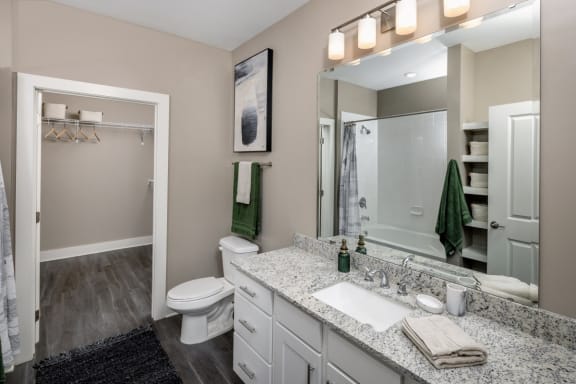 our apartments offer a bathroom with a shower at Fairview Springs in Covington, GA, 30016