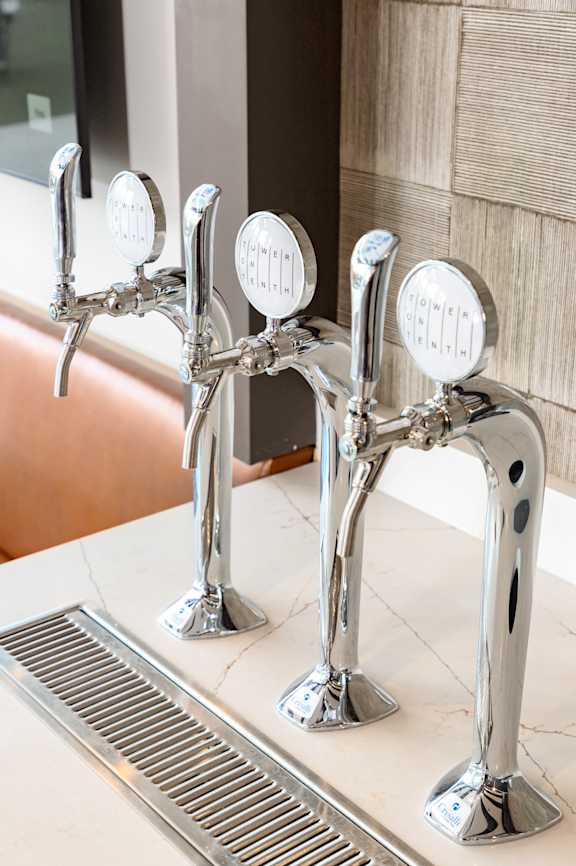 a close up of the taps in the bathroom at Tower on Tenth Apartments, Birmingham, AL