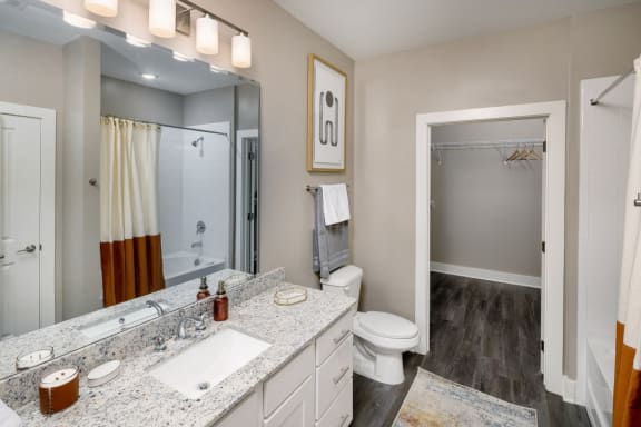 our apartments offer a bathroom with a shower at Fairview Springs in Covington, GA, 30016