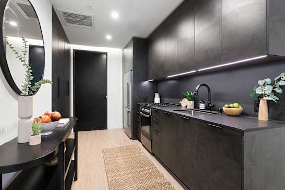 B5 - under cabinet lighting and stained granite counters