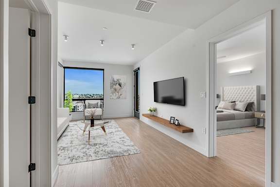D - Living room with access to both bedrooms on opposite ends