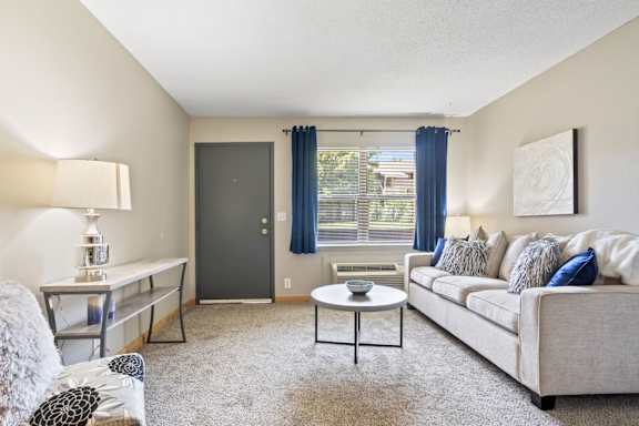 a living room with a couch and a coffee table