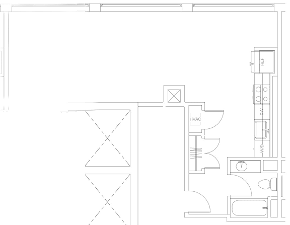 A floor plan of a room with a kitchen area and a bathroom.