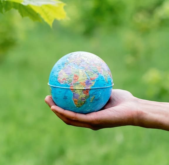 Holding A Earth Statue at Patterson Place, Santa Barbara