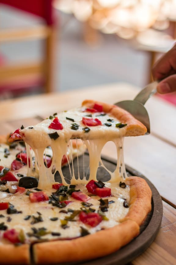 Delicious Pizza Dinner at Rancho Franciscan Senior Apartments, California, 93105