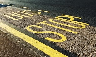 Sign Of Bus Stop at Rancho Franciscan Senior Apartments, California