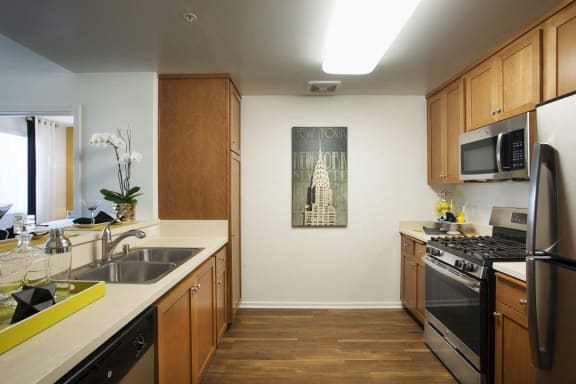Upscale Stainless Steel Kitchen Appliances With Refrigerator at Hancock Terrace Apartments, California, 93454