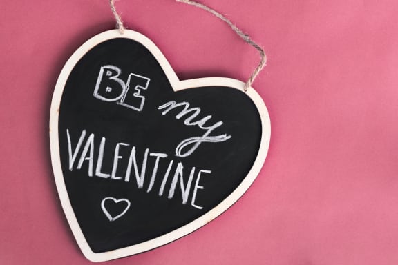 black_heartshaped_sign_written_white_chalk_pink_background at Cypress Meadows Senior Apartments, Ventura, CA, 93003